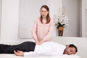 Qi Wellness MJinTreating_man_back